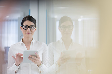 Image showing Business Woman Using Digital Tablet in front of startup Office