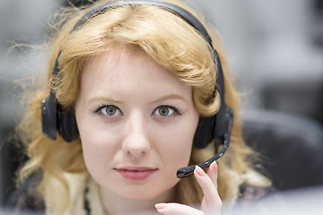 Image showing female call centre operator doing her job