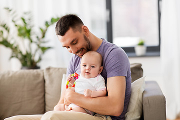 Image showing happy father with little baby daughter at home