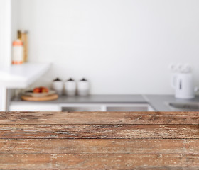 Image showing blurred kitchen background with wooden boards