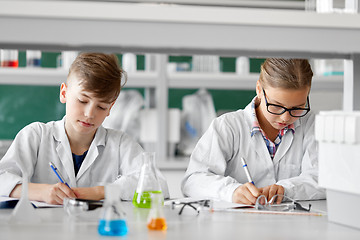 Image showing kids studying chemistry at school laboratory