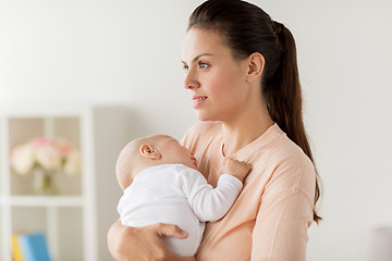 Image showing mother holding sleeping baby