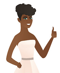 Image showing Young african-american fiancee giving thumb up.