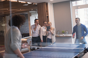 Image showing startup business team playing ping pong tennis