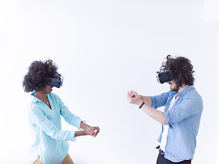 Image showing multiethnic couple getting experience using VR headset glasses