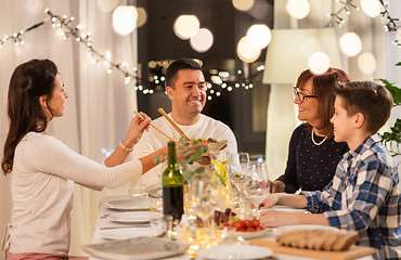 Image showing happy family having dinner party at home