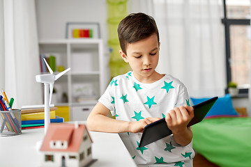 Image showing boy with tablet, toy house and wind turbine