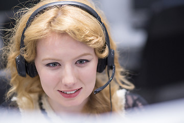 Image showing female call centre operator doing her job