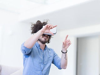 Image showing man using VR-headset glasses of virtual reality