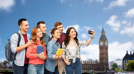 Image showing students taking selfie by smartphone over london