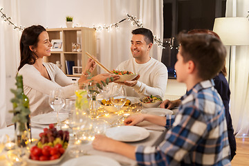 Image showing happy family having dinner party at home