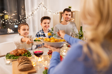 Image showing happy family having dinner party at home