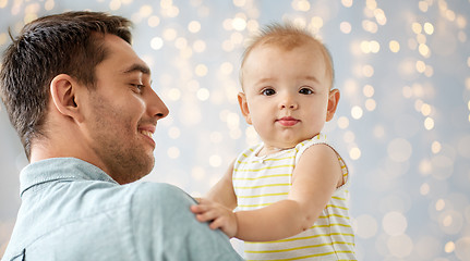 Image showing father with little baby daughter at home