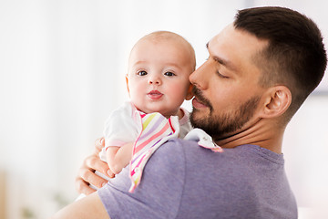 Image showing father with little baby girl at home