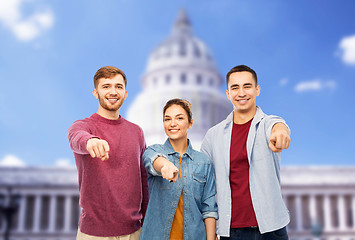 Image showing friends pointing at you over capitol building