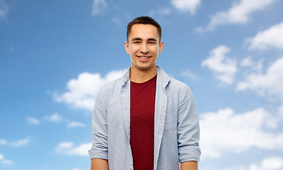 Image showing smiling young man over white background