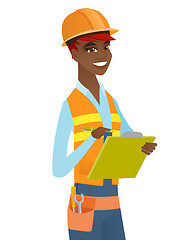 Image showing Young african building inspector with clipboard.