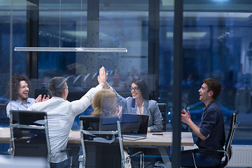 Image showing startup Group of young business people celebrating success