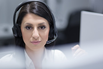 Image showing female call centre operator doing her job