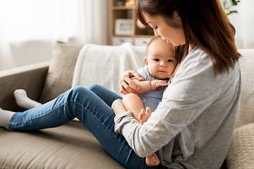 Image showing happy mother with little baby son at home