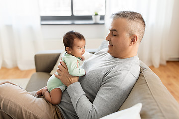 Image showing happy father with little baby boy at home