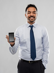 Image showing indian businessman with smartphone