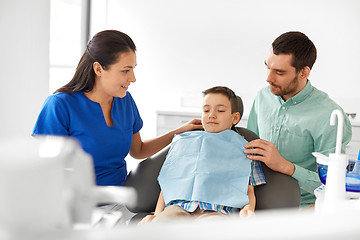 Image showing female dentist with kid patient at dental clinic