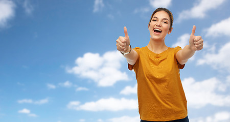 Image showing woman or teenage girl in t-shirt showing thumbs up