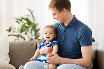 Image showing happy father with baby son at home