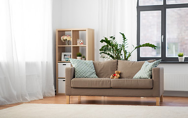 Image showing sofa with cushions at cozy home living room