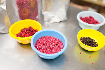 Image showing berries in bowls at confectionery shop kitchen