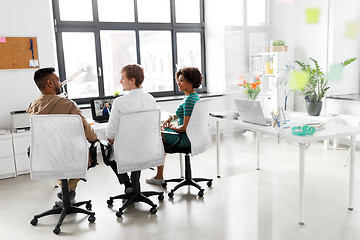 Image showing creative team having video conference at office