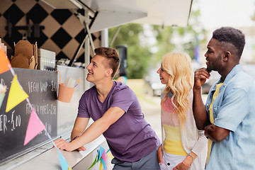 Image showing happy customers queue or friends at food truck