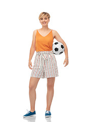 Image showing smiling teenage girl with soccer ball