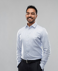 Image showing indian businessman in shirt over grey background