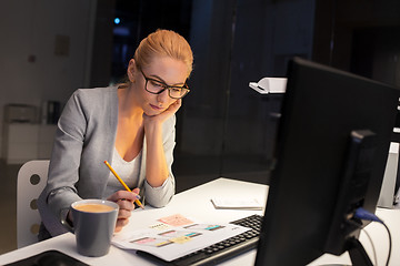 Image showing designer working on user interface at night office