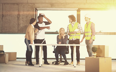 Image showing group of multiethnic business people on construction site