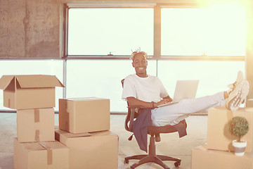 Image showing young black casual businessman on construction site