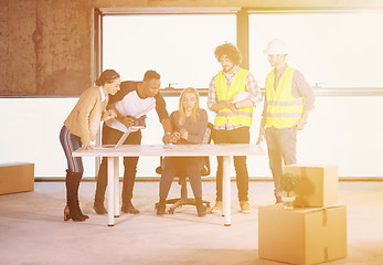 Image showing group of multiethnic business people on construction site