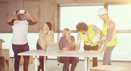 Image showing group of multiethnic business people on construction site