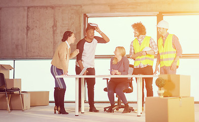 Image showing group of multiethnic business people on construction site