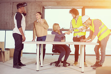 Image showing group of multiethnic business people on construction site