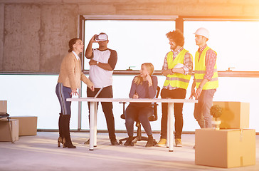 Image showing group of multiethnic business people on construction site