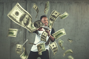 Image showing black businessman making the rain of money