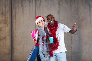 Image showing young multiethnic business couple celebrating new year party