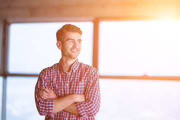 Image showing portrait of young casual businessman on construction site