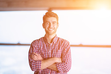 Image showing portrait of young casual businessman on construction site