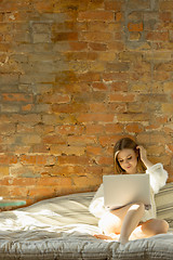 Image showing Beautiful young woman relaxing at home, comfort and calm