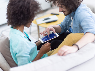 Image showing multiethnic couple in living room