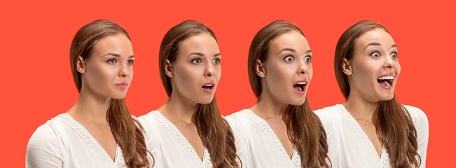 Image showing Beautiful woman looking suprised isolated on red